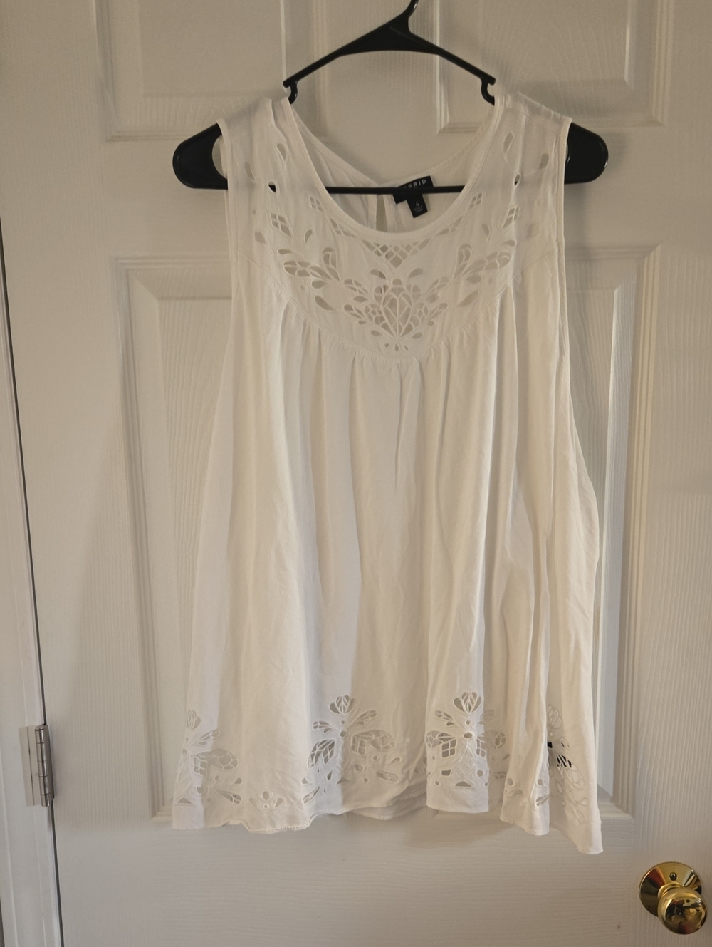 Lightweight White Cutout Sleeveless Top